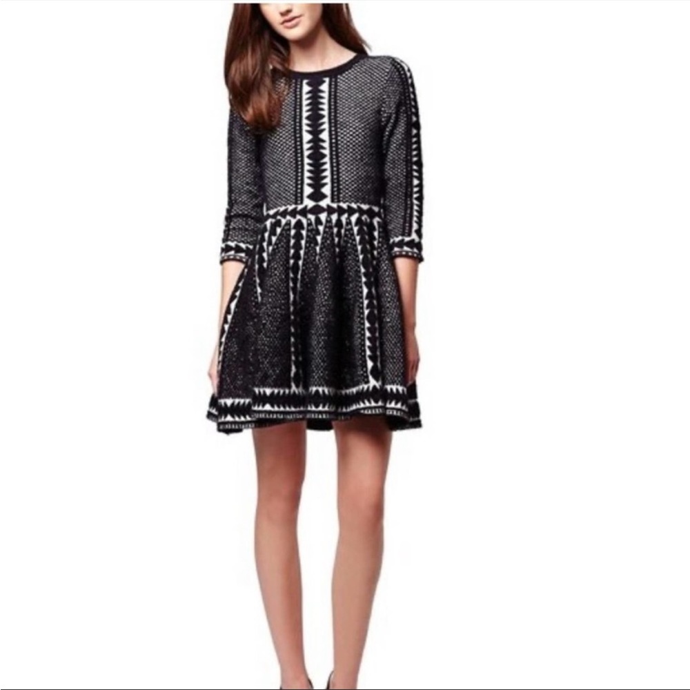 Black and white sweater dress with embossed pattern
